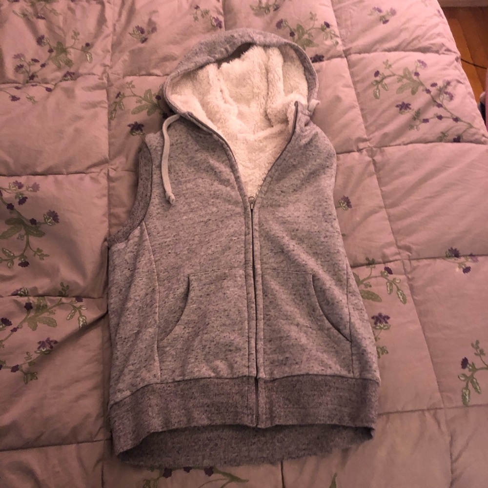 Grey and white Uniqlo vest